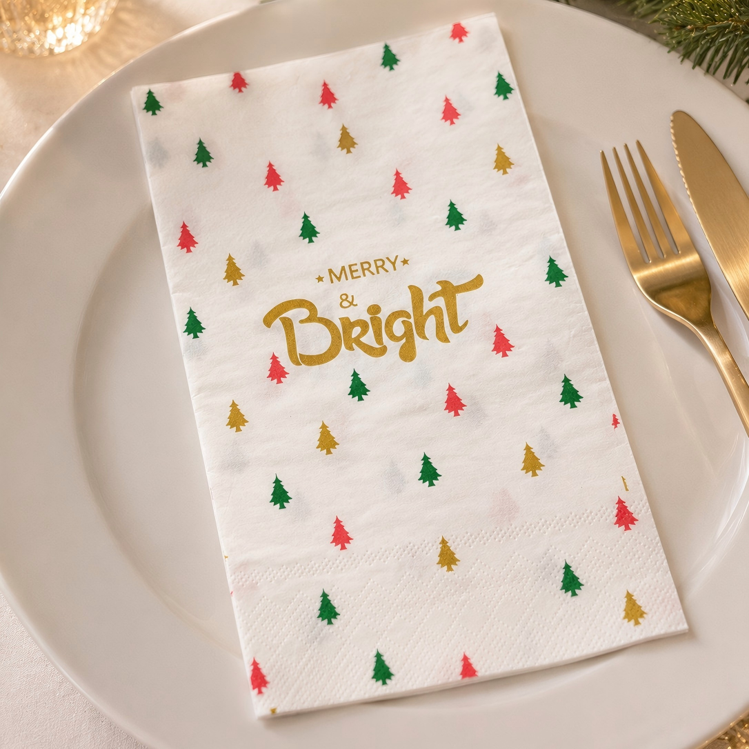 Einweg-Servietten mit fröhlichem und leuchtendem Golddruck für die Tischdekoration auf Weihnachtsfeiern